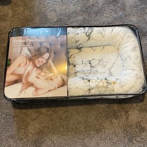 Dock A Tot Deluxe Plus baby lounger